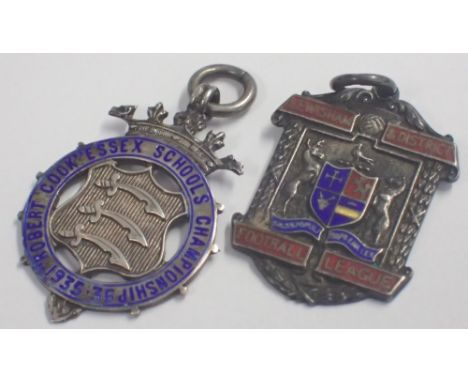 Two hallmarked silver and enamel watch fobs Lewisham Football League and Robert Cook Essex Schools Championship