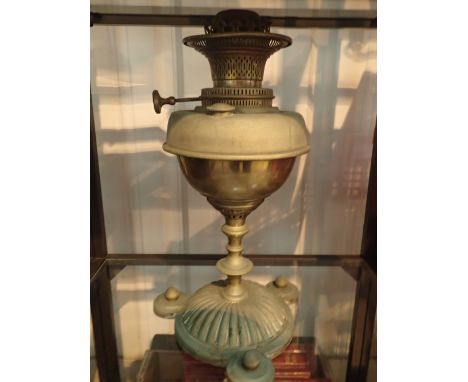 Brass lamp with cast iron base