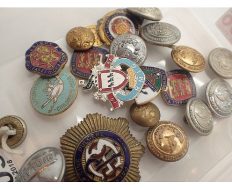 Box of enamel badges and buttons