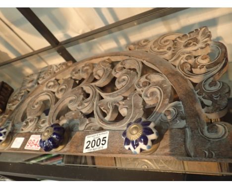 Carved wooden wall bracket and ornate coat hanger with ceramic knobs 