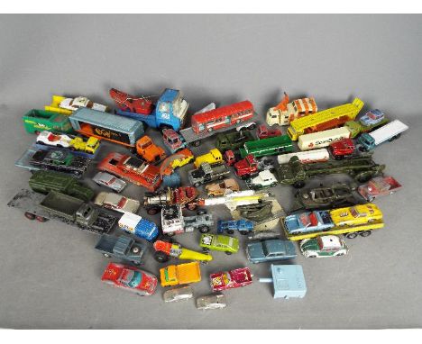 Dinky - Corgi - Matchbox - A quantity of over 50 loose diecast vehicles in various scales including Dinky # 623 Army Wagon, #