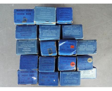 Hornby Dublo - 18 boxed items of Hornby Dublo freight rolling stock and accessories. Lot includes#32070 D1 Oil Tank Wagon 'Ro