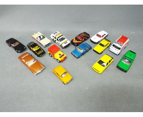 Corgi - A collection of 14 x loose vehicles in 1:36 scale including # 343 Ford Capri 3.0 S, # 1006 Corgitronics Radio van, # 