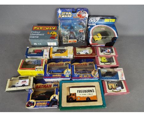 Corgi, Lledo, Others - A mixed collection of mostly boxed diecast and a handheld Pac-Man game. Lot includes Corgi TY06701 Jam
