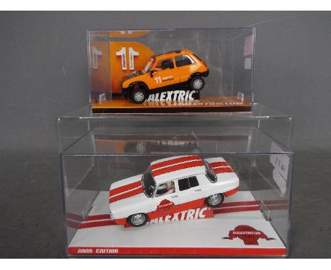 Scalextric - two Scalextriclub Tecnitoys , 2009 Edition #6372 and 2011 Edition #6481, both in perspex display cases