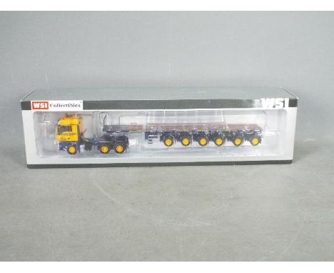 WSI Collectibles - A boxed 1:50 scale #9401 MAN TGX XLX 6x4 with Ballast Trailer 'Ainscough'. The model appears Mint in an Ex