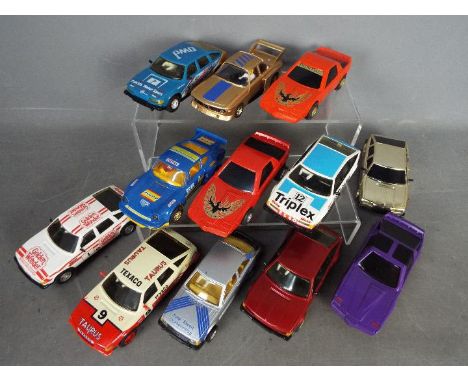 Scalextric - twelve Scalextric cars to include Rover 3500 Patrick Motor Sport ,Porsche, Rover 3500 Texaco Taurus, BMW 3.0 and