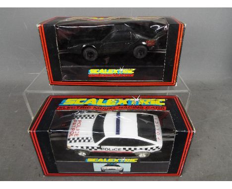 Scalextric  by Hornby - two Scalextric Electric Model Racing Cars comprising C.100 K.I.T.T. Knight Rider and C.362 Police Car