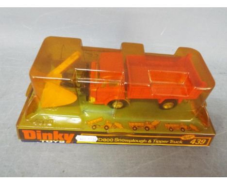 Dinky - A boxed # 439 Ford D800 Snowplough &amp; Tipper Truck with orange cab and back. This version has opening cab doors an