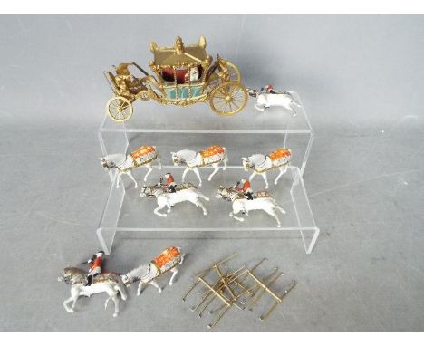 Britains - An unboxed Britains #1470 State Coach (post War Version) with gilt coloured coach, red interior and blue side pane