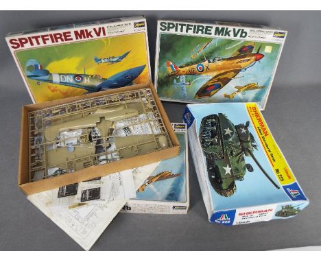 Hasegawa - 4 x boxed model kits in 1:32 &amp; 1:35 scale. Lot includes two Supermarine Spitfire Vb,one x Spitfire VI, one x S