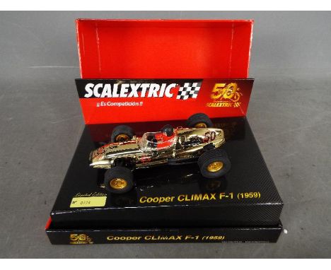 Scalextric - a limited edition 50th Anniversary Cooper Climax F-1 (1959) by Scalextric, No. 0774, vehicle appears mint in exc