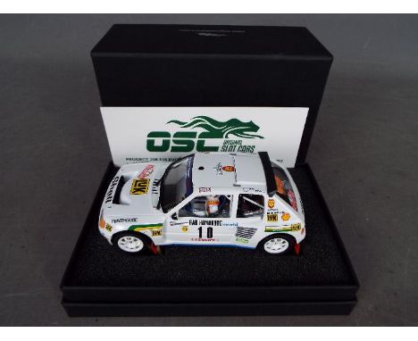 OSC Original Slot Cars - a Peugeot 205 T16 Evo1 Mouton-Harryman &gt; Monte Carlo 1986  model slot car, 1:32 scale, appears mi