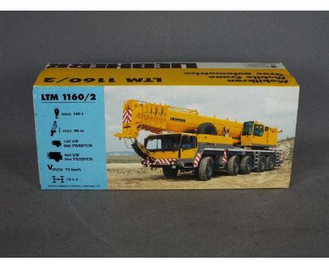 Conrad - A boxed 1:50 scale Conrad #2090 Liebherr 1160/2 Mobile Crane 'Ainscough Heavy Crane Division'. The model appears Nea