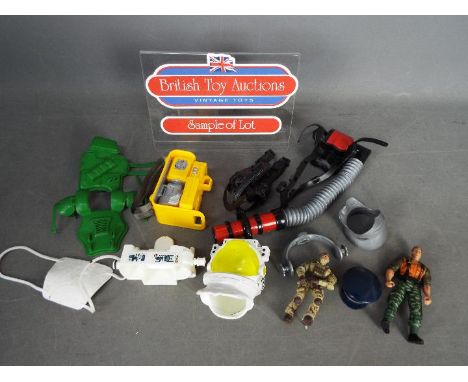 Hasbro - Action Man - A large quantity of Action Man accessories including back packs, helmets, weapons and similar. The item