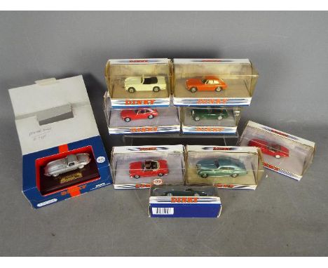 Matchbox Dinky - A group of 9 x boxed cars in 1:43 scale including # DY019/B an MGB GT V8 in Red, # DY-3B MGB GT in Orange, #