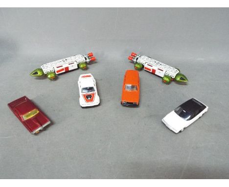 Dinky - A collection of 6 x vehicles including 2 x 359 Eagle Transporters, # 173 Pontiac Parisienne, # 219 Jaguar XJ 5.3C and