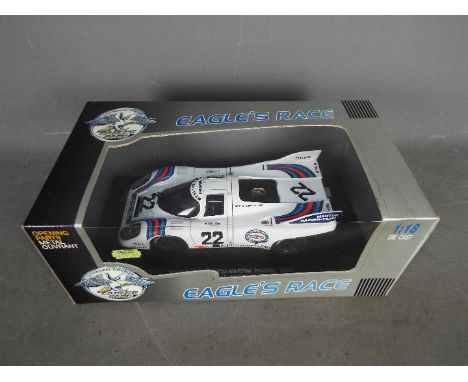 Universal Hobbies - a 1:18 scale diecast Eagles's Race Porsche 917K No 22 Martini Racing Team 1971 24h Le Mans Winner, appear