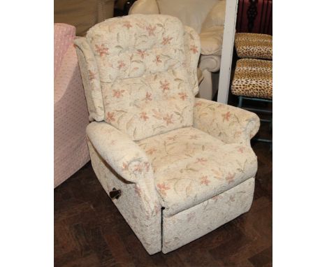 G plan manual reclining chair in cream and floral covering 