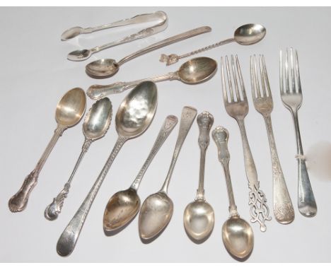 Odd silver spoons and flatware and a pair of sugar nips, gross weight of lot 10 oz troy