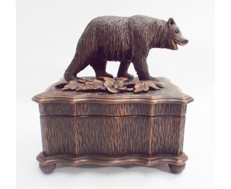 Carved black forest bear mounted musical trinket box approx 16cm wide 