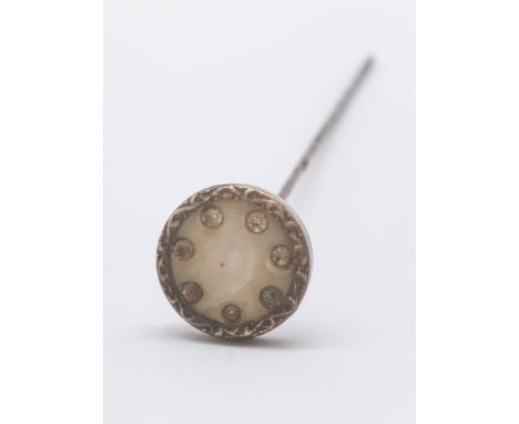 Scottish hardstone brooch in unmarked silver mount, similar oval banded agate brooch and a stick pin.