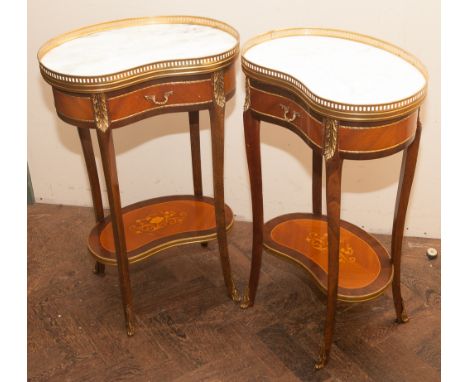 Pair of reproduction French style kidney shaped lamp or bedside style tables each fitted one drawer with white flecked marble