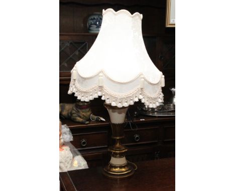 Brass and white porcelain table lamp with cream patterned shade 