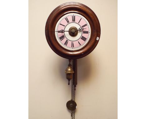 French postman's style circular wall clock with pink and white enamel dial, overall 11" diameter 