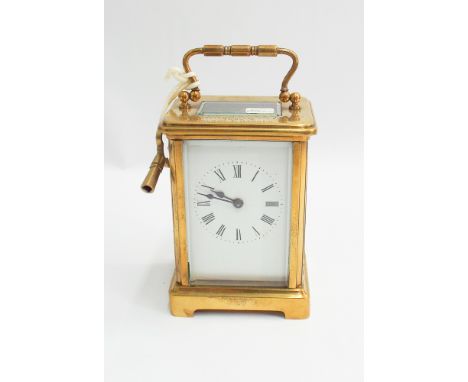 Edwardian French brass carriage clock with key; presentation inscription to top of case - A Squadron Musketry 2nd prize, 1904