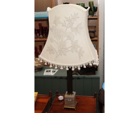 Large gilt Corinthian column table lamp with marble base and cream beaded shade 