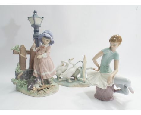 Lladro seated ballerina figure, young girl sweeping garden with lamp post behind, and a group of 3 geese.  Tallest figure 33c