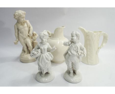 A Royal Worcester flat back jug, cabbage leaf moulded jug and three glazed Blanc de Chine figurines of cherubs, tallest figur