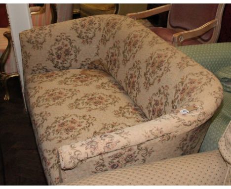 Small tub shaped 2 seater settee in fawn floral tapestry