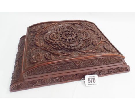 Anglo Indian carved hardwood trinket box of domed rectangular form 28cm wide 