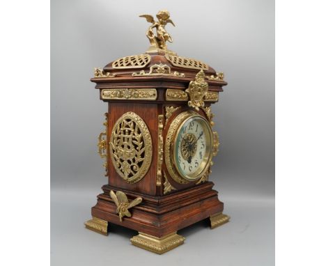 S. Marti, late 19th century French oak mantle timepiece, moulded case extensively decorated with brass mounts, 3 1/2" dial wi