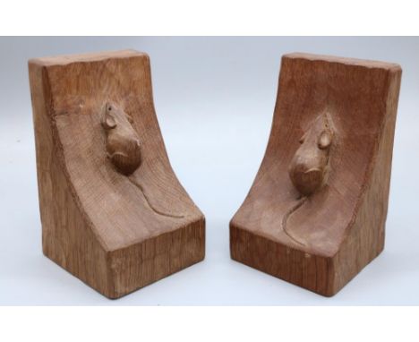 Robert Mouseman Thompson of Kilburn - a pair of adzed oak bookends, carved with signature single mice, W9cm D9cm H14.5cm (2)S