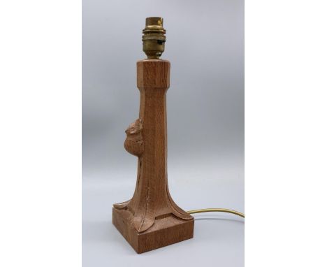 Robert Mouseman Thompson of Kilburn - an adzed oak table lamp, tapered column on square base, carved with signature mouse, wi