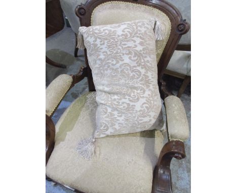 Victorian walnut framed open arm chair, upholstered back and seat on turned supports with ceramic casters, and loose cushionP