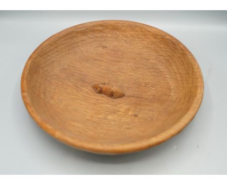 Robert Mouseman Thompson of Kilburn - an adzed oak circular bowl, centre carved with signature mouse, D30cmShipping £35.00 pl