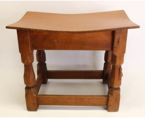 Robert Mouseman Thompson of Kilburn - an oak joint type stool, the dished adzed rectangular nailed top on four octagonal balu