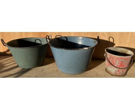 French blue enamel two-handled wash tub, a similar green wash tub and a vintage red fire bucket, W62cm D62cm H44cm max (3)POA