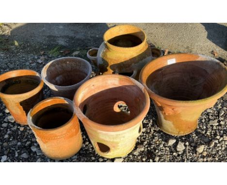Four various terracotta planters, a similar bulb pot and a strawberry planter, H34cm max (6)Expected age related wear and tea