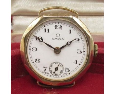 Ladies Omega 9ct gold wristwatch, signed white enamel Arabic dial with rail track minutes and subsidiary seconds, Dennison ca