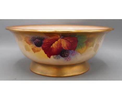 Royal Worcester circular bowl decorated with blackberries and flowers, painted by Kitty Blake, signed, with gilt rim and foot