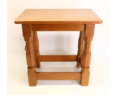 Robert Mouseman Thompson of Kilburn - an oak rectangular stool, with adzed top on octagonal baluster supports with stretchers