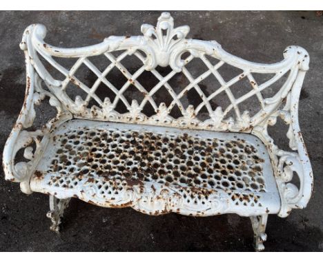 Small cast iron garden bench, with lattice back and honeycomb pierced seat on scroll supports, W95cm D46cm H82cmPOA  https://
