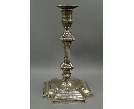 Georgian style silver candlestick, circular sconce on knopped faceted column and shaped stepped square base, by Mappin & Webb