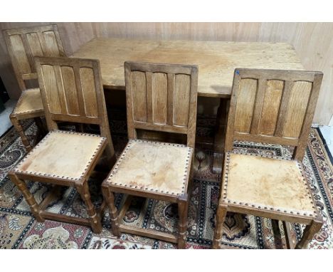 Sid Pollard of Thirsk - an oak refectory style dining table, adzed rectangular top on adzed octagonal end supports with adzed