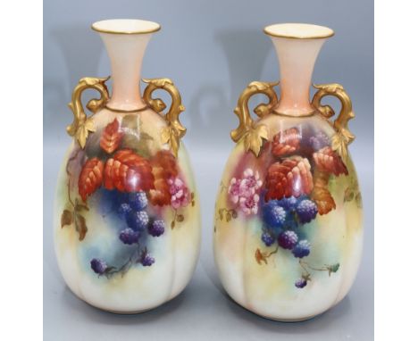Pair of Royal Worcester twin handled ovoid vases painted with leaves and berries, H20cmShipping £38.00 plus vat (UK Only)